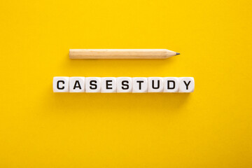 Case Study word with pencil on yellow background