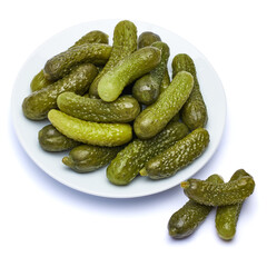 Wall Mural - Plate of Tasty canned Whole green cornichons isolated on a white background