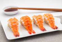Ebi Nigiri Sushi Or Shrimp Nigirizushi, Molds Of Seasoned Cooked Japanese Rice, Kome, With Toppings Of Fresh Cooked Shrimp Prawn. Sushi Is A Kind Of Japanese Food Well-know All Over The World. 