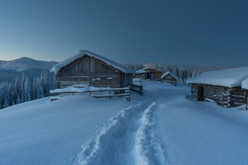 Wall Mural - beautiful winter views of the high tatra mountains with tourists, skiers and amazing states of natur