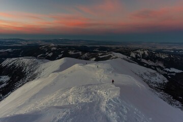 Wall Mural - beautiful winter views of the high tatra mountains with tourists, skiers and amazing states of natur