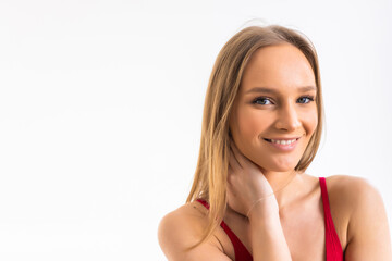 Wall Mural - beautiful young woman with hands in the neck isolated on white background