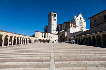 Wall Mural - Assisi village in Umbria region, Italy. The most important Italian Basilica dedicated to St. Francis - San Francesco.