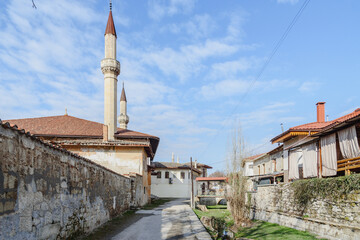 Wall Mural - View of Big Mosque and North gate of Khan's Palace from River Street. Bakhchysarai. Crimea