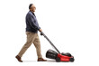 Full length profile shot of a mature man using a lawnmower