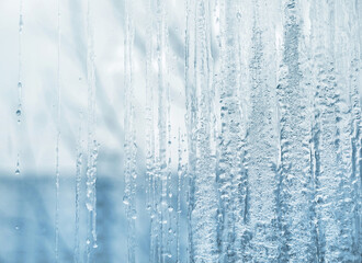 Wall Mural - frozen glass. winter ice pattern on frozen window. frozen water on the window glass