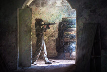 Soldier Training While Playing Paintball In The Fortress