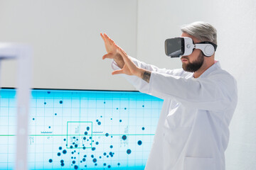 Wall Mural - genetic engineers are using virtual reality technology. professional team of scientists is working o