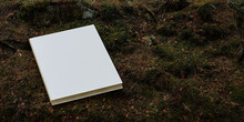 Blank Book Mockup Placed On Vegetation, Notebook Mockup. Mockup On Nature Background 01