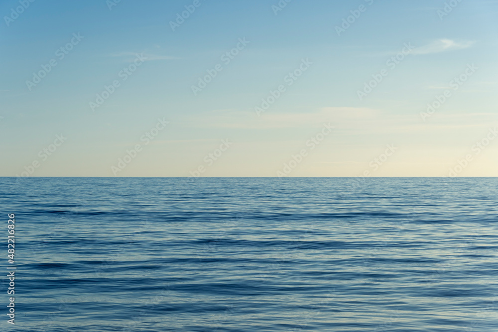 clear sky and calm sea or ocean water surface background Stock Photo ...