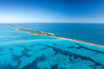 Wall Mural - The drone panoramic view of Rose island, Bahamas.Rose Island is a small island in the Bahamas that lies 5 kilometres  east of Paradise Island, which lies directly off of New Providence Island.