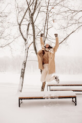 Young Asian woman in winter location with snow