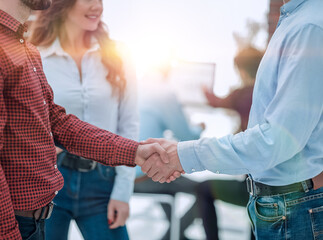 Poster - Business people handshake in modern office.