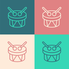 Sticker - Pop art line Musical instrument drum and drum sticks icon isolated on color background. Vector