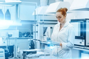 professional female scientist is working on a vaccine in a scientific research laboratory. genetic e
