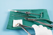  Dentistry medical tools forcept upper/ lower on blue background.