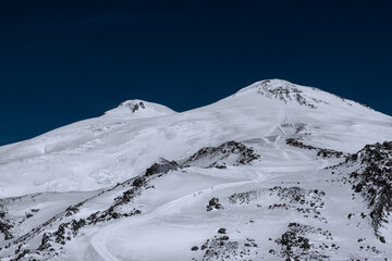 Wall Mural - Amazing snowy mountain landscape of the Caucasus, peaks of mount Elbrus on a clear blue sky day