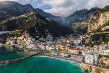 Italy, Province Of Salerno, Amalfi, Drone View Of Town On Amalfi Coast With Mountains In Background