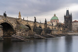 Fototapeta Londyn - Charles bridge in Prague, Czechia. Architecture and landmark of Prague. Long exposure.