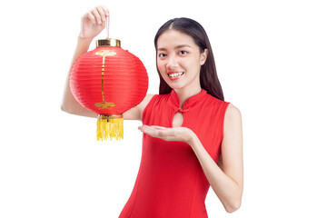 Wall Mural - Asian Chinese woman in a cheongsam dress holding lantern