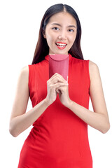 Wall Mural - Asian Chinese woman in a cheongsam dress holding red envelopes (Angpao)