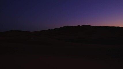 Wall Mural - Beautiful view of sand dunes in the Sahara desert during dusk or sunrise, Sunset over sand dunes in desert landscape