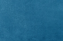 The Texture Of A Beautiful Plain Fleece Fabric. The Structure Is Clearly Visible.