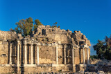 Fototapeta  - ruins of the ancient Roman nymphaeum - a sacred fountain with a source of water - in Side, Turkey