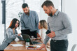 © standret - Conception of success. Group of business people that working on the project in the office