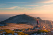 © ADDICTIVE STOCK - Unrecognizable traveler admiring mountains in Spain
