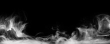 Panoramic View Of The Abstract Fog. White Cloudiness, Mist Or Smog Moves On Black Background. Beautiful Swirling Gray Smoke. Mockup For Your Logo. Wide Angle Horizontal Wallpaper Or Web Banner.