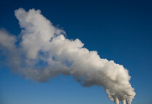 White Cloud Formed By Biofuel�factory Against Blue Sky