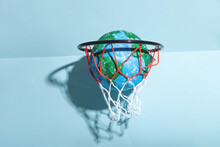 Small Earth Ball In Basketball Hoop
