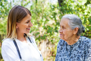 Canvas Print - Elderly female with kind phyisician