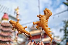Chinese Deep-fried Dough Stick Or Chinese Doughnut Which Called Patongo In Dinosaur And Crocodile Shape From Chiangmai. Popular Breakfast In Thailand.