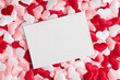Leinwandbild Motiv Valentine's Day background. White postcard mockup on background of pink and white hearts. Saint Valentine. Flat lay, top view, copy space