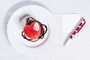 Wall Mural - Valentine's day Heart shaped chocolate and strawberry cake. Celebration of love concept.