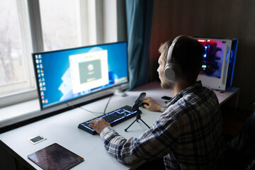 call center manager making a voice chat call to the client using computer in the office