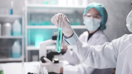 Wall Mural - medical scientist team are working on science laboratory research term by using microscope and scien