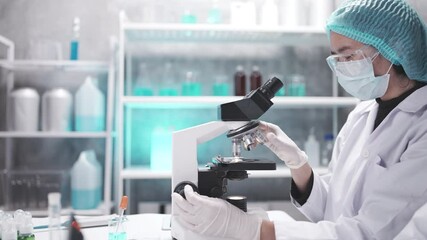 Wall Mural - medical scientist team are working on science laboratory research term by using microscope and scien