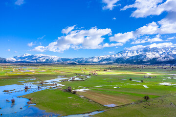 Wall Mural - Plateau Lasithi in the inland of the island of Crete with snow, Greece