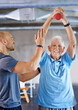 © Yuri Arcurs/peopleimages.com - You're getting there. Shot of a physiotherapist helping a senior man with weights.