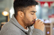 © Jade M/peopleimages.com - This cough is getting bad. Cropped shot of a young man coughing.