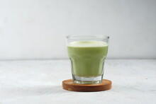 A Glass Of Japanese Matcha Latte, Green Tea With Milk Or Soy Milk, 
Whitw Background