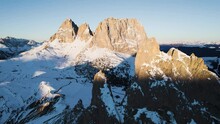 Winter Passo Sella in the Dolomites with Drone close to rocks