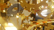 © เท้ PY15MU - A gold part of gear ring with blur gold gear background (3D Rendering)
