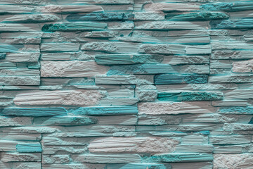 Wall Mural - Decorative stone wall of green color with beautiful texture