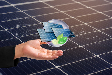 Wall Mural - Businesswoman hands Solar cell and eco icon over solar cell system, Solar cell energy, Care of the Environment, clean energy, Ecology concept.