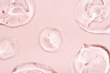 Transparent Hyaluronic Acid Gel On A Pink Background.