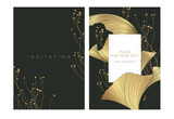 Fototapeta  - Wedding invitation template in luxury style. Abstract gold leaves and wildflower drawn on a dark gray background. Background for the invitation card, shop, beauty salon, spa. 